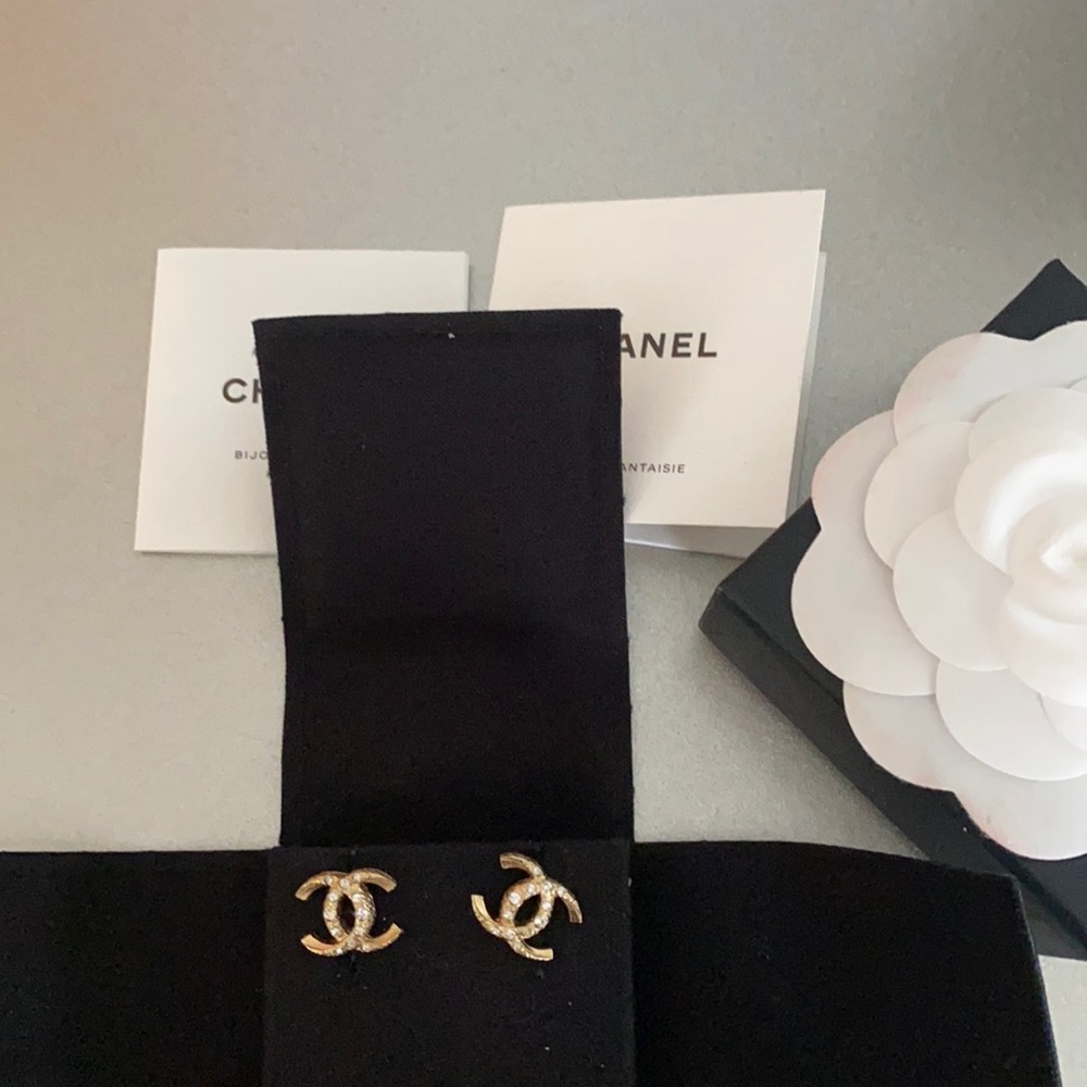 Chanel gold earrings with diamonds.
